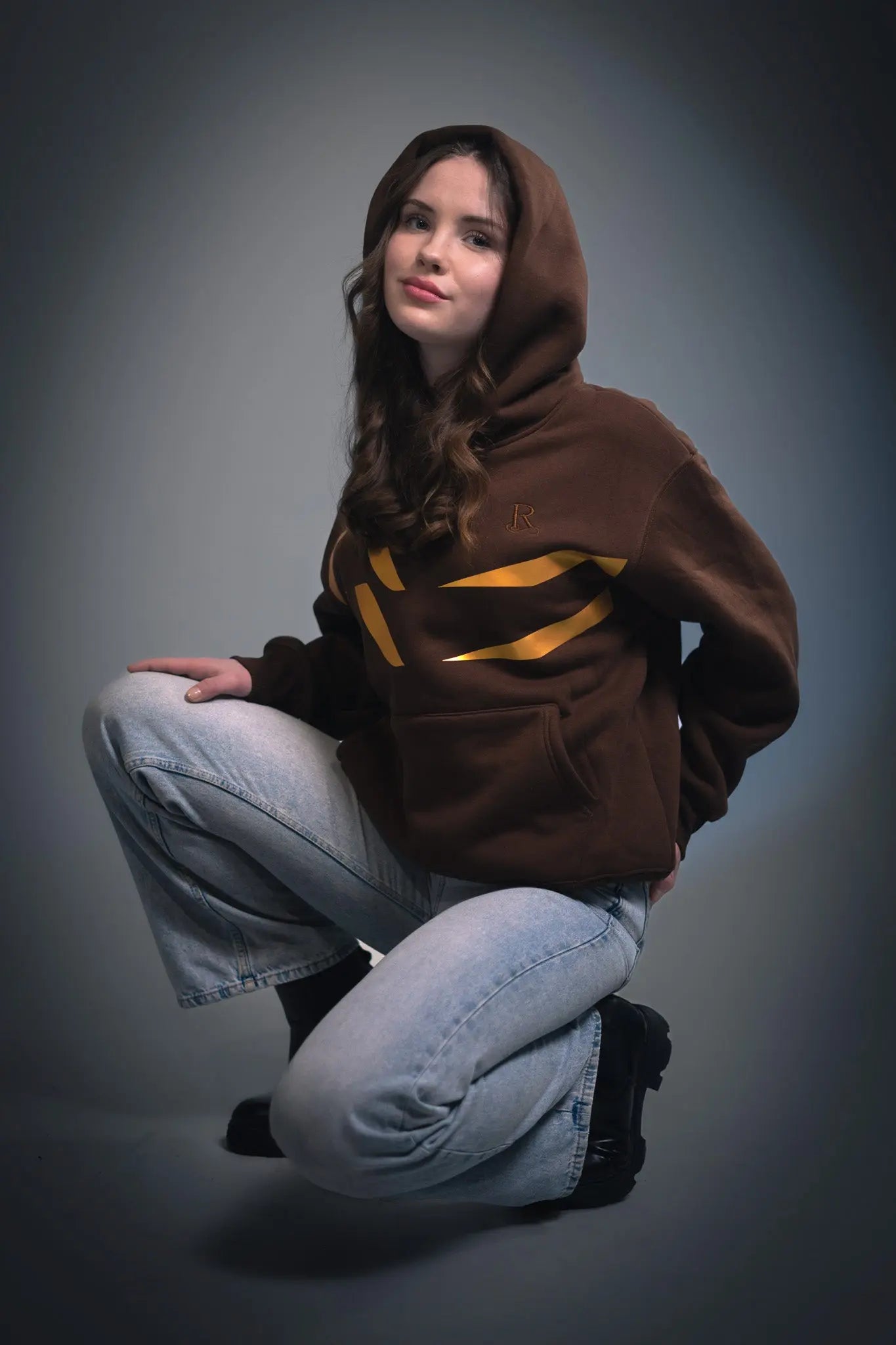 Rickay brown signature gold mark hoodie front fit