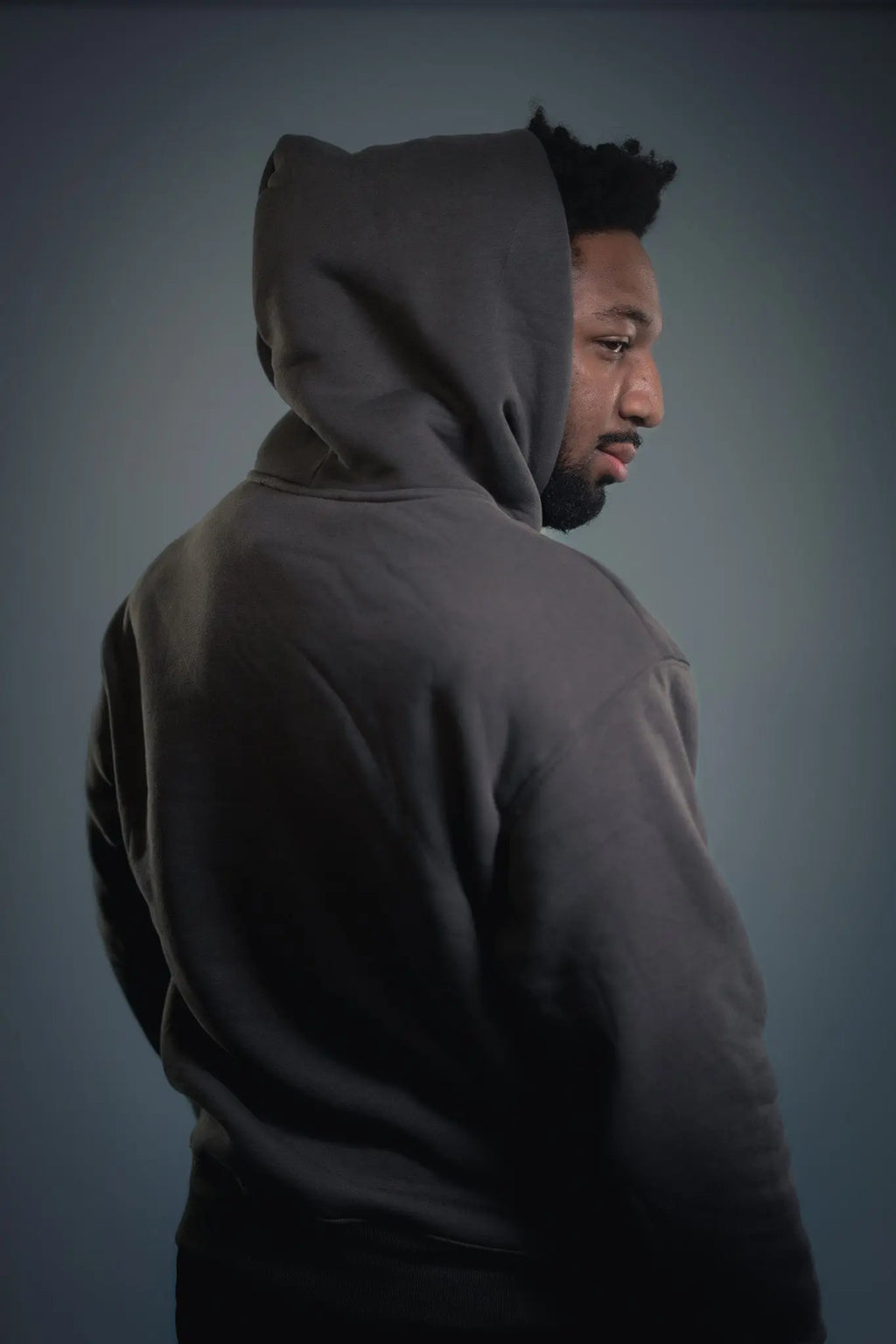Rickay grey hoodie back view with statement